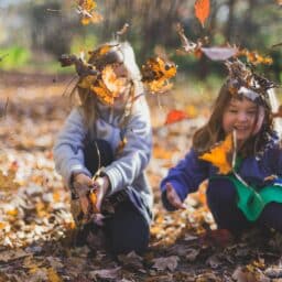 Children playing in the leaves.